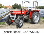 Small photo of Massey Ferguson 133 Super of the year 1974 at an exhibition in Glandorf, Lower Saxony, Germany, 09-17-2023