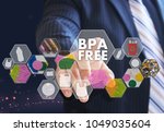 Small photo of The businessman chooses BPA FREE a on the virtual screen in industrial network connection.The concept made by plastic tare of FREE bisphenol A