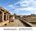 Small photo of Hampi's temples in Karnataka, India, exemplify exquisite architecture and cultural richness, with iconic sites like the Virupaksha and Vitthala Temples standing out.