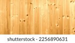 Board clapboard.Sheathing the walls of the sauna.Wooden texture.Wooden wall in the house as a background