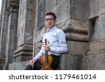 Portrait Of Violinist In Castle