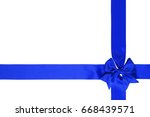 gift blue bow with tails and... | Shutterstock . vector #668439571