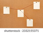 Small photo of Blank paper notes are pinned to a cork board. The concept of detective investigation. Copy space.