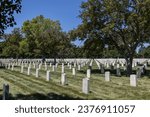 Small photo of Minneapolis, Minnesota, USA - May 27, 2023: Landscape view of soldier gravestones at Fort Snelling National Cemetery on a clear day.