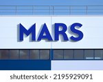 Small photo of Poznan, Poland - August 27, 2022. Mars, Inc. logo on its chewing gum factory. Mars is an American multinational manufacturer of confectionery, pet food, and other food products.