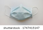 used medical face mask isolated ... | Shutterstock . vector #1747415147