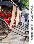 Small photo of Good-looking Japanese rickshaw or jinrikisha with bamboo blind in dogo onsen.