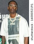 Small photo of Young Dolph - attending the Green Carpet of the 2019 BET Hip-Hop Awards on October 5th 2019 at the Cobb Energy Performing Arts Centre, in Atlanta Georgia - USA