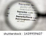 Small photo of The word or phrase Heretofore in a dictionary