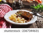 Small photo of Pasticada with gnocchi, beef stew in a sauce. Croatian cuisine