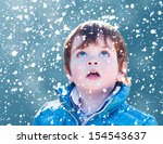Child Looking Snow Falling With ...