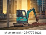 Small photo of Compact crawler excavator work on construction site, excavate trench in modern residential district. Mini excavator digs trench, laying underground communications during construction