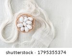 Small photo of silkworm cocoon, top view Silk cocoons commercially bred caterpillar of silkworm moth, fiber thread and fabric made from silkworm cocoons.