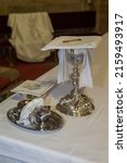 Small photo of Plasencia, Spain - May 21h, 2022: Chalice, wine, water pitcher and pyx at Saint Nicholas Church, Plasencia, Caceres, Extremadura, Spain
