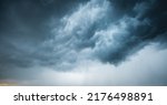 Small photo of Tropical ominous clouds in front of the hurricane. Awesome photo of the texture of storm clouds. Adverse weather conditions. Climate change. Wallpaper force of nature. Discover the beauty of earth.