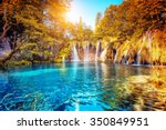 Majestic view on turquoise water and sunny beams.  Location famous resort Plitvice Lakes National Park, Croatia, Europe. Dramatic and vivid scene. Beauty world. Retro filter. Instagram toning effect. 