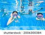 Little Kids Swimming  In Pool ...