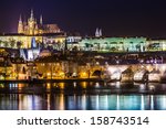 The View on Prague gothic Castle with Charles Bridge in the Night, Czech Republic