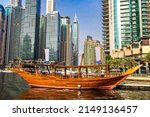 Old wooden ship, Dhow cruise in Dubai Marina, Dubai, United Arab Emirates