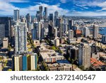 Small photo of Panoramic aerial view of Seattle business district with Mount Rainier in the background in a sunny day in Seattle, USA