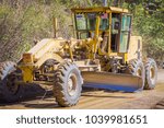 Small photo of CHIANG RAI, THAILAND - FEBRUARY 01, 2018: Outdoor view of heavy machinery for rail road construction in Chiang Mai, Thailand, working on a road construction site to smooth the ground