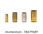 Different sized bullet casings over white background