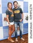 Small photo of ARLINGTON, TX - APR 18: Singer Thomas Rhett (R) and wife Lauren Akins attend the Cracker Barrel Country Checkers Challenge at Globe Life Park in Arlington on April 18, 2015 in Arlington, Texas.