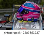 Small photo of CHAMROUSSE, FRANCE, August 20, 2022 : Young woman driver Emeline Breda helmet during the annual uphill car race, counting for French Championship.