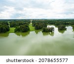 Lednice, Czechia. 28th of August 2021. View down from Minaret tower to visitors and over castle lake to popular Lednice castle in the large park, Czechia