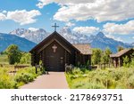 Sunny exterior view of the Chapel of the Transfiguration of Grand Teton National Park at Wyoming