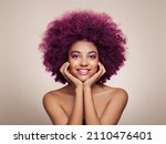 Small photo of Beauty portrait of African American girl with colorful dyed afro hair. Beautiful black woman. Cosmetics, makeup and fashion