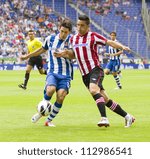 Small photo of BARCELONA, SPAIN - SEPTEMBER 16: Javi Lopez (L) and Isma Lopez in action during the Spanish League match between Espanyol and Athletic Club, final score 3-3, on September 16, 2012 in Barcelona, Spain.