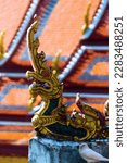 Small photo of Elements of Thai Temple sculpture: dragon, three-faced janus, samsara, solstice, elephant, symbols of power, caitya, gilding, etc. Ecclesiastical luxury
