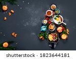 Christmas tree made of breakfast menu on grey background. Top view, Copy space