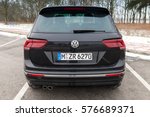 Small photo of Hamburg, Germany - February 10, 2017: Outdoor photo of second generation Volkswagen Tiguan, 4x4 R-Line. Black compact crossover vehicle CUV manufactured by German automaker Volkswagen, rear view