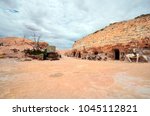 Small photo of COOBER PEDY, SA, AUSTRALIA - NOVEMBER 13: Hill with Crocodile Harry's underground home with cacophonous collection of decorations and messages from visitors, November 13, 2017 , Coober Pedy, Australia