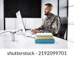 Military Student Education. Army Soldier Veteran With Computer