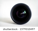 Objective lens of photo camera for photo or video  closeup on white background