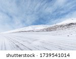 road on snow area plateau, snow covered the national highway in Tibet, China