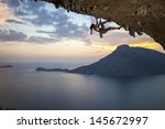 Young Female Rock Climber At...