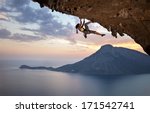 Young Female Rock Climber At...