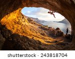 Young Woman Lead Climbing In...