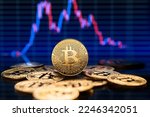 Bitcoin and cryptocurrency investing concept with graph. Bitcoin cryptocurrency coins. Trading on the cryptocurrency exchange. Trends in bitcoin exchange rates. Rise and fall chart of bitcoin.
