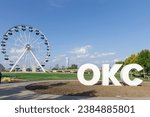 Small photo of Oklahoma City, USA - October 25th, 2023: Wheeler Ferris Wheel, Wheeler District, amusement park ride.