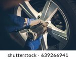 Winter Tires Replacement and Rotation in the Car Service. Vehicle Seasonal Maintenance.