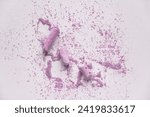 Small photo of White Background With Light Pink Crushed Chalk. Small Pieces of Lilac School Chalk Lying on Spilled Powder. Layout Made of Crushed Pastel Pink Chalk. Flat Lay.