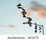 Sneakers Hung Around Telephone...