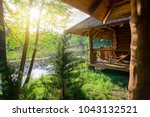 Wooden house and river