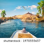 Boat driving on river nile in...