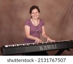 Small photo of Ellington, CT, USA - Jan 23, 2011 - 2013-2015 Connecticut state troubadour, Kristen Graves at the Piano